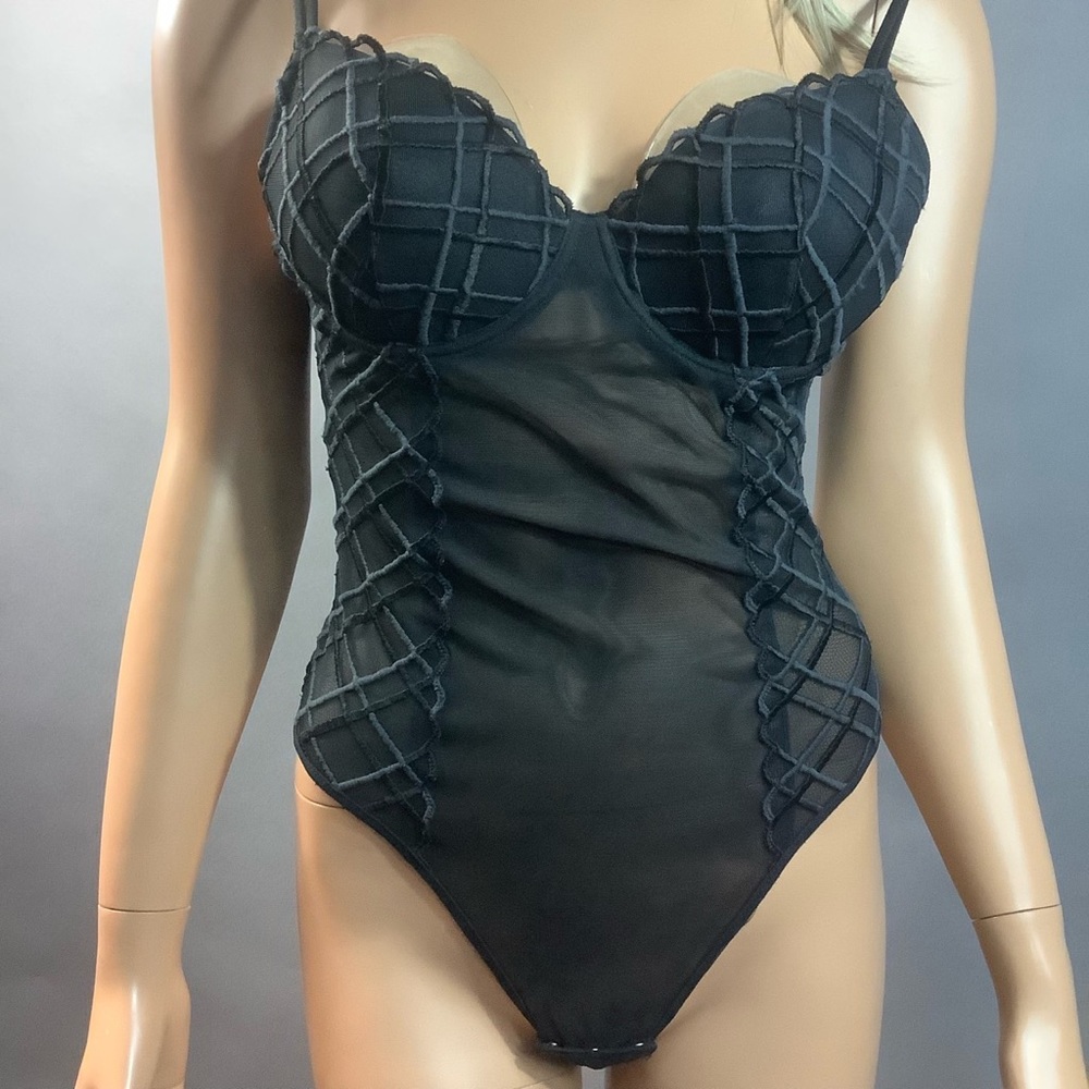 Christie’s Size 3, bodysuit made in Italy.